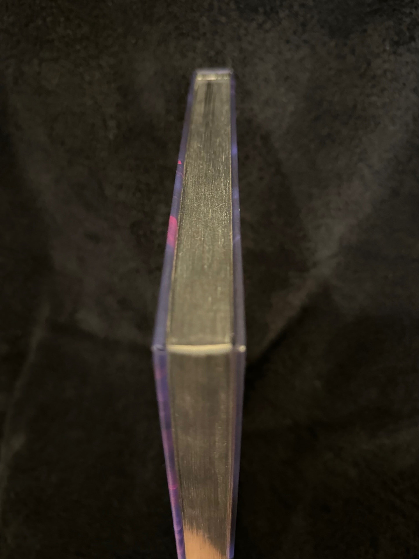 Close view of a book's gold gilded page edges