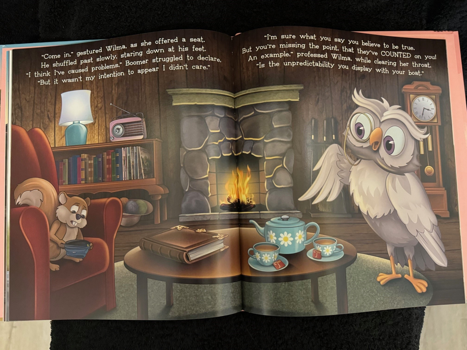 Open children's picture book spread printed on matte paper